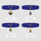 Four blue chokers with different heart-shaped pendants on a light gray background