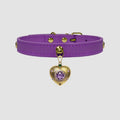 Purple choker with a gold heart-shaped charm on a light gray background